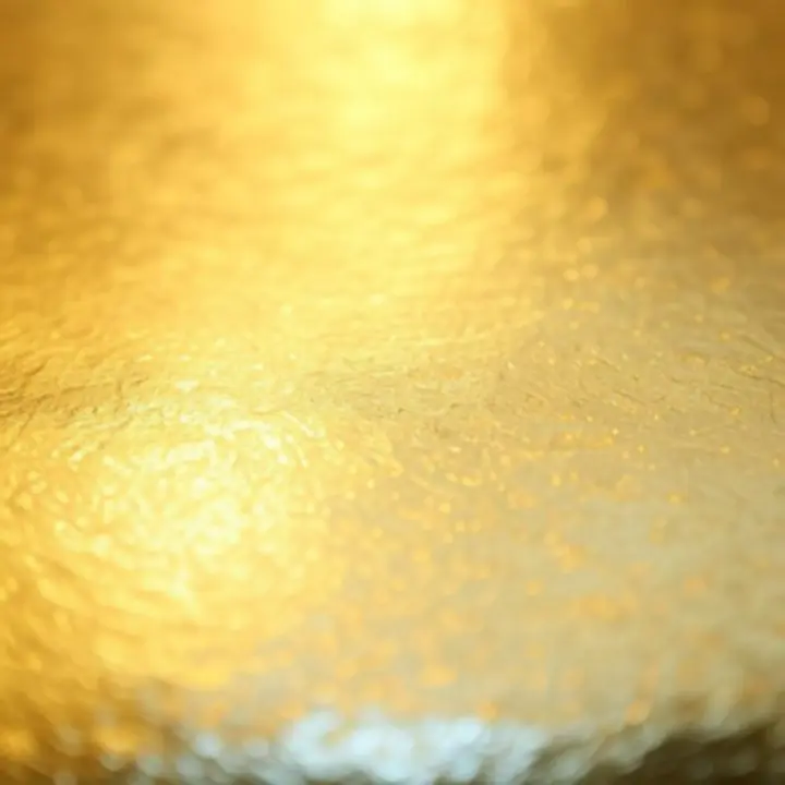 Zbliżenie tekstury i faktury złota 18k